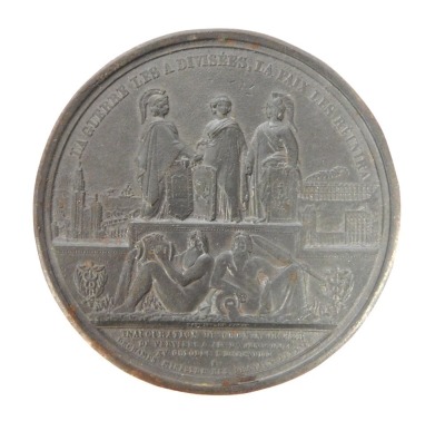 A bronze commemorative medallion. The obverse inscribed LEOPOLD I ROI DES BELGES, EALT FECIT,. The reverse cast with neoclassical figures and marked LA GUERRE LES A DIVISEVES LE PAIX LES REUNIRA INAUGURATION DI CHEMIN DE FER DE VERVIERS ALXIA CARELLE, XV