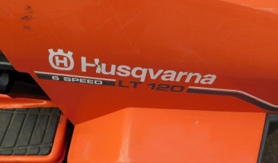 A Husqvarna six speed LT120 petrol ride-on mower. - 2