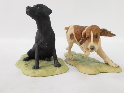 Two Border Fine Arts figures of dogs, comprising black Labrador, and Cocker Spaniel, 9cm and 8cm high respectively. (2) - 2