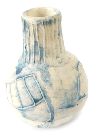A Kahn Pottery studio pottery vase, with ribbed stem and flower body on a blue ground, stamped to underside, 9cm high.