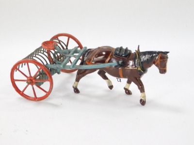 A Britains lead figure of a Shire Horse pulling harrows. - 2