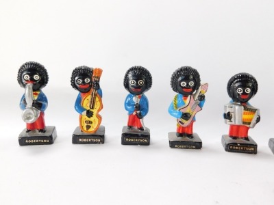 Nine Robertsons advertising figures, each painted, together with a pin badge (AF). (10) - 2