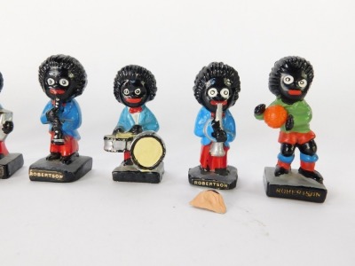 Nine Robertsons advertising figures, each painted, together with a pin badge (AF). (10) - 3