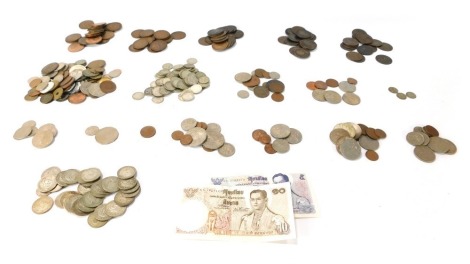 A group of World coinage, comprising UK Pennies, Australian Shillings, Chinese tokens, etc. (1 pouch)