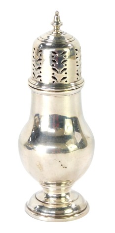 A George V silver sugar shaker, with domed body, Birmingham assay, date rubbed, with weighted base, 5¼oz gross.