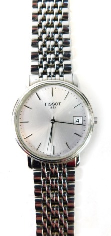 A Tissot gentleman's wristwatch, stainless steel strap with silvered dial and date aperture, boxed.