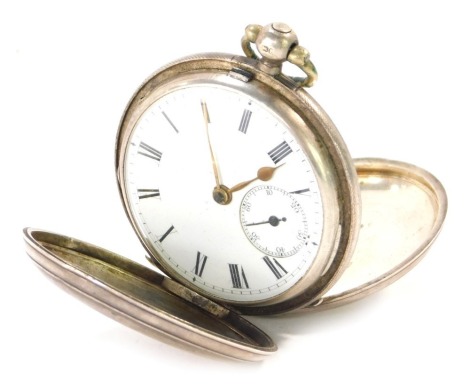 A Victorian silver full hunter pocket watch, with white enamel Roman numeric dial, second hands, maker J W, key wind, London 1879, 100.4g all in.