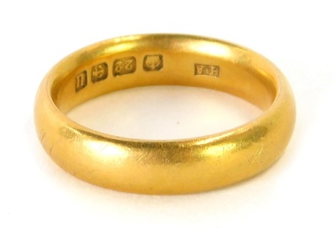 A 22ct gold wedding band, of plain design, Birmingham, size M ½, 8g.