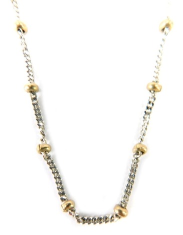 A 9ct gold bi-colour necklace, with curve links and ball breaks, on white and yellow gold, 60cm long, 8.8g all in.