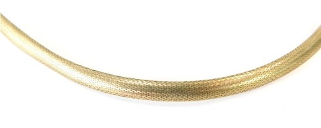 A 9ct gold articulated neck chain, of woven design with clasp and safety chain, 50cm long, 5.4g all in.