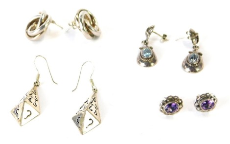 Four various pairs of silver earrings, to include a pair of interlinked circular earrings, diamond set hoops, aquamarine set Eastern style drop earrings, and a pair of amethyst Scottish style earrings, 22.8g all in.