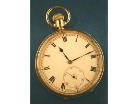 A 9ct gold pocket watch with white enamel dial and subsidiary second dial