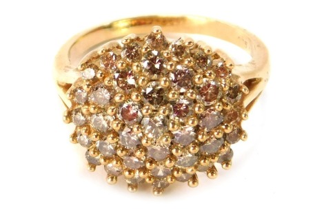 A 9ct gold cluster ring, the central cluster design set with tiny diamonds in claw setting, with V splayed shoulders, ring size P½, 5.4g all in.