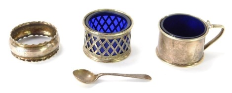 Silver and silver plated wares, comprising silver plated salt pot with blue glass liner, silver plated mustard with blue glass liner, silver napkin ring and silver caddy spoon.