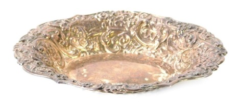 An Elizabeth II silver sweet meat dish, of rococo design, Birmingham 1955, 2¼oz, 15cm diameter.