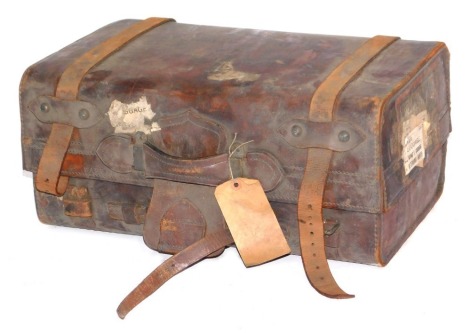 A leather travel case, with GWR Paddington labels, stamped Warrented Sole Leather, 51cm high, 20cm wide, 31cm deep. (AF)