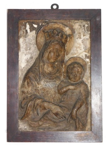 A late 19thC plaster religious icon, figure of Mary and baby Jesus, in an oak frame, 31cm x 20cm.