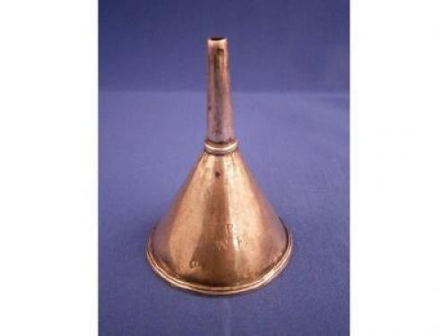 An 18/19thC white metal funnel with a moulded band