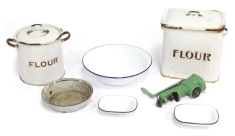 A group of enamel wares, comprising two flour tins, and two enamel bowls, mincer, etc. (a quantity)