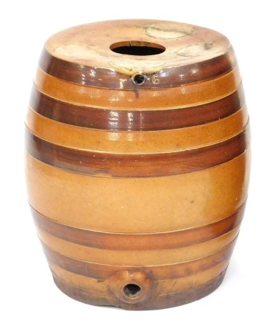 A 19thC two tone stoneware spirit barrel, with brown and treacle glaze band strapping, 41cm high, 28cm diameter.