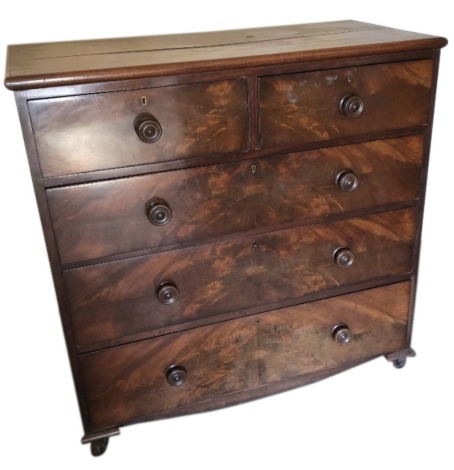 A Victorian flame mahogany chest, of two short and three long graduated drawers with knob handles, 109cm wide.