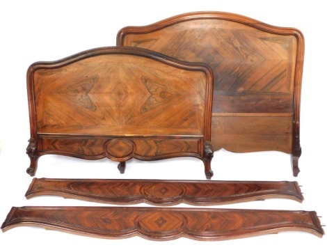 A 19thC French walnut lit bateau, comprising bed head and foot board, with side rails, and the bed base also comes with it and is 130cm wide.