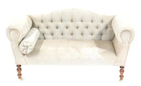A Victorian style boudoir sofa, with button back, turned legs with castors, 135cm wide.