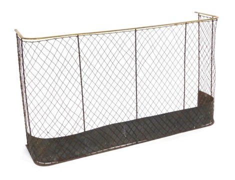 An early 19thC brass topped wire work spark guard and fender, 73cm high., 122cm wide.