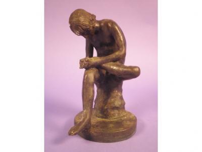 A late 19thC bronze figure of a seated Achilles