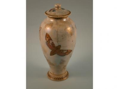 A Carlton Ware butterfly lustre baluster vase and cover