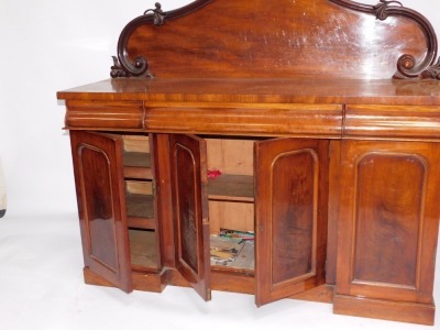 A Victorian mahogany sideboard, with scroll back, three cushion drawers and four door inverted breakfront base on plinth, 153cm wide. - 2