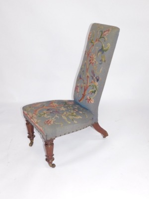 A Victorian mahogany prie dieu chair, with tulip carved forelegs with castors. - 2