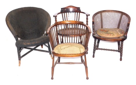 An early 20thC loom shell shaped chair, a bergere tub chair and two other tub chairs each with slatted back and carved seat. (4)