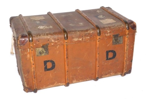 A early 20thC copper and wooden bound travel trunk, with labels for Peterborough, Skegness, etc., marked DD, 50cm high, 90cm wide, 60cm deep.