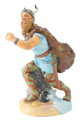 A Royal Doulton Viking figure, matt glazed, 23cm high.