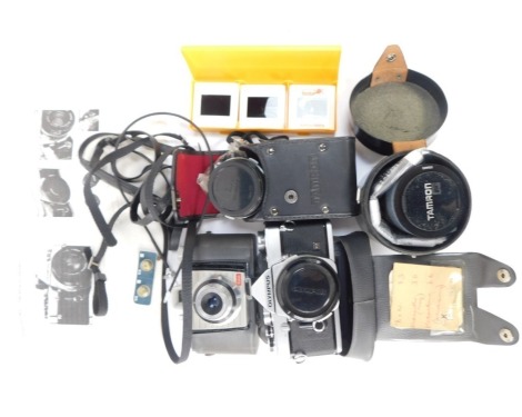 Camera and optics equipment, comprising Olympus MD camera, Kodak Flash, Tamron SP lens, Olympus 28mm lens, and a Kodak Colour Snap camera. (1 tray)