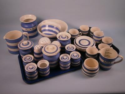 A large quantity of T.G. Green blue Cornishware jars