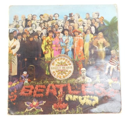 The Beatles Sergeant Pepper's Lonely Hearts Club Band album. - 2