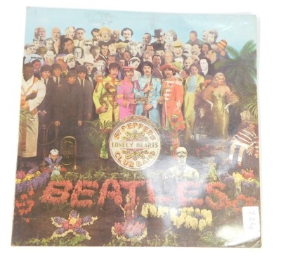 The Beatles Sergeant Pepper's Lonely Hearts Club Band album. - 2