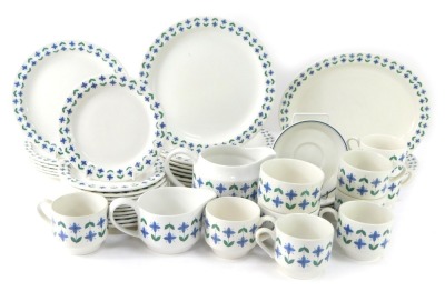 A Staffordshire Midwinter part dinner service, comprising eight cups, four saucers, large jug, milk jug, two sugar bowls, twelve small plates, eight dinner plates, two oval serving plates and five medium plates. - 3