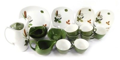 A Stylecraft by Midwinter part tea service, with green floral pattern, comprising teapot, two milk jugs, two sugar bowls, seven cups and saucers, seven side plates and a cake plate. - 2