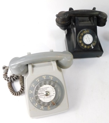 Four Bakelite and plastic telephones, two black, one cream and one grey. (4) - 5