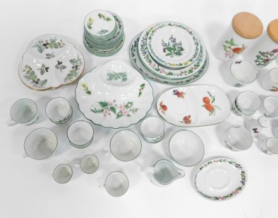 A group of Royal Worcester Worcester Herbs pattern tea wares, comprising kitchen cannisters, cups and saucers, soup bowls, milk jug, plates, ramekins, etc. (a large quantity) - 6