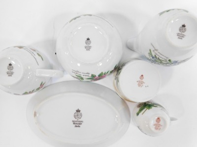 A group of Royal Worcester Worcester Herbs pattern tea wares, comprising kitchen cannisters, cups and saucers, soup bowls, milk jug, plates, ramekins, etc. (a large quantity) - 8