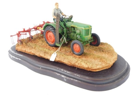 A Country Artists Farming figure group, entitled 'Tedding the Grass' by Steve Boss and Tony Slocombe, limited edition No 65/500, on wooden base with plaque, 43cm diameter.