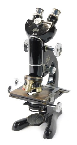 A Beck London microscope, Serial No 21727, Model 48, in wooden fitted case, 42cm high, and with a Starscope telescope attachment.