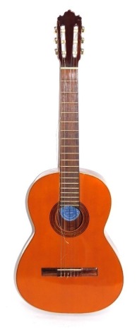 A Ramirez acoustic guitar, in carry case.