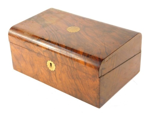 A 19thC walnut writing box, with domed lid, with brass central plates and key plate, 15cm high, 35cm wide, 22cm deep.