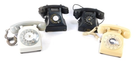 Four Bakelite and plastic telephones, two black, one cream and one grey. (4)