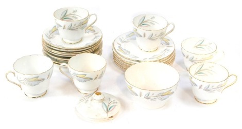 A Shelley Caprice pattern part tea service, comprising sugar bowl, teapot lid, six cups, five saucers, four breakfast cup saucers, and seven side plates.